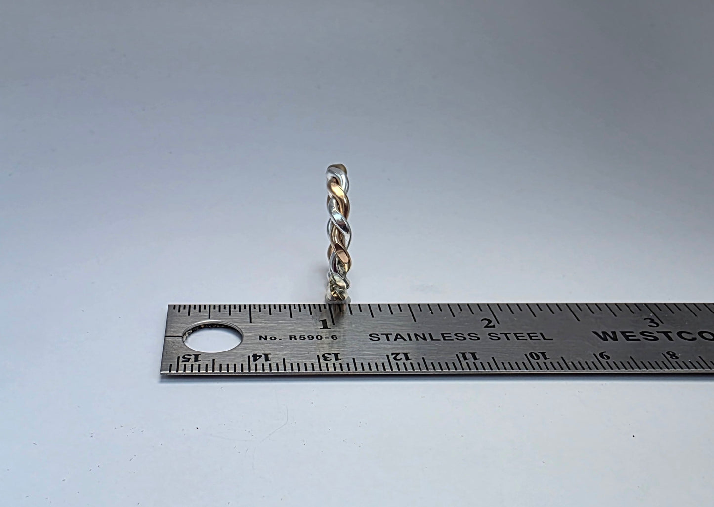 Two-toned smooth silver twist ring 2/16" wide