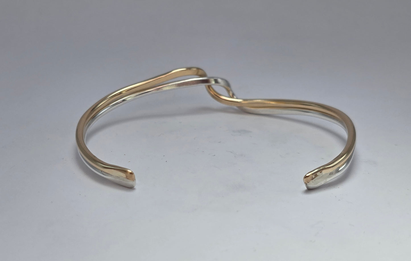 Two toned smooth Sterling Silver and 14kt gold filled wave bracelet