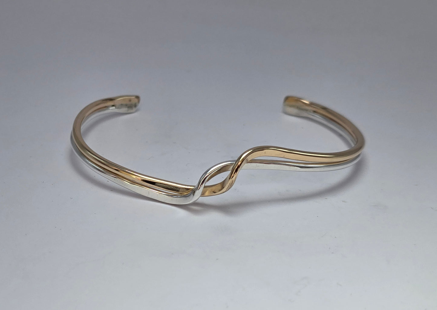 Two toned smooth Sterling Silver and 14kt gold filled wave bracelet