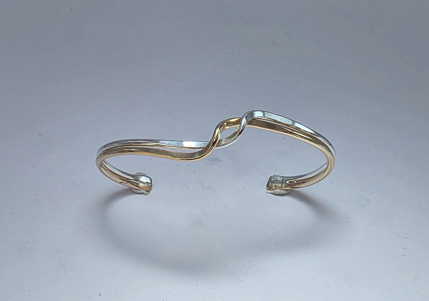 Two toned smooth Sterling Silver and 14kt gold filled wave bracelet