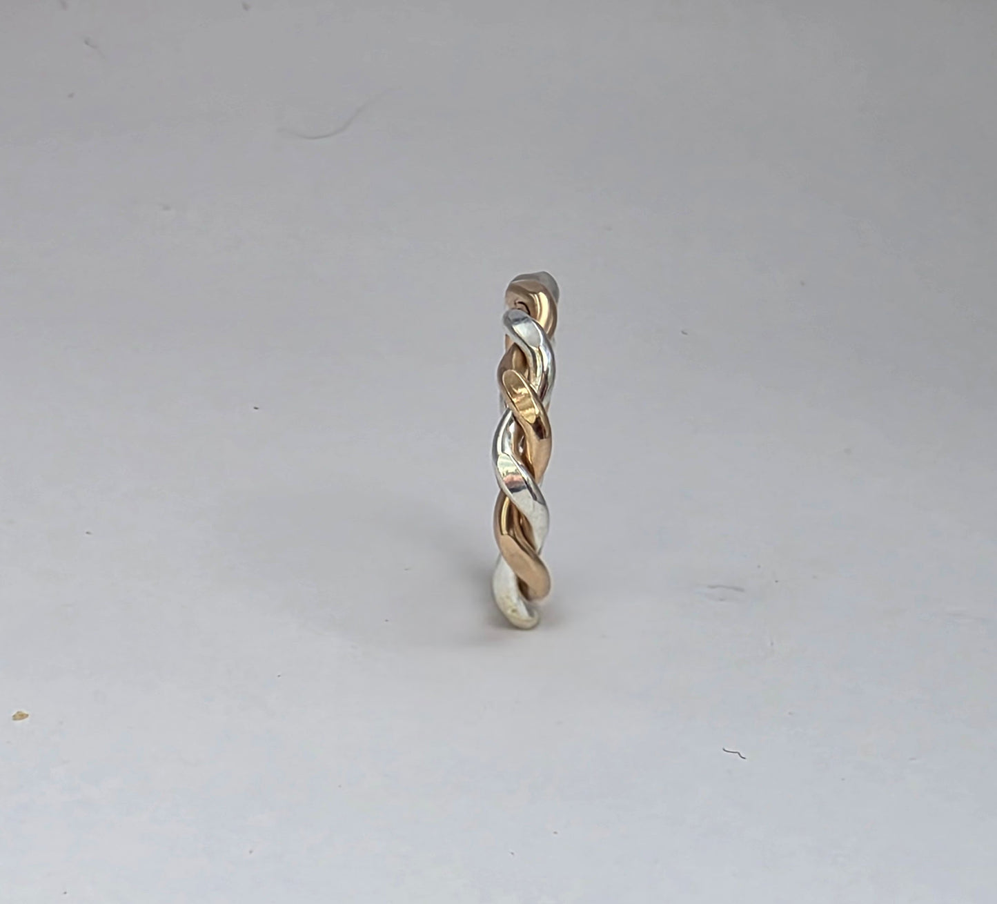 Two-toned smooth silver twist ring 2/16" wide