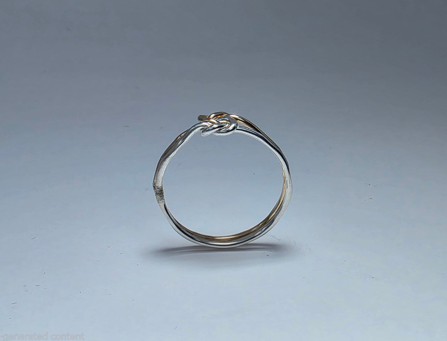 Two-toned knot ring