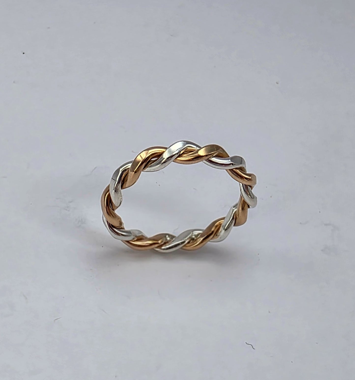 Two-toned smooth silver twist ring 2/16" wide