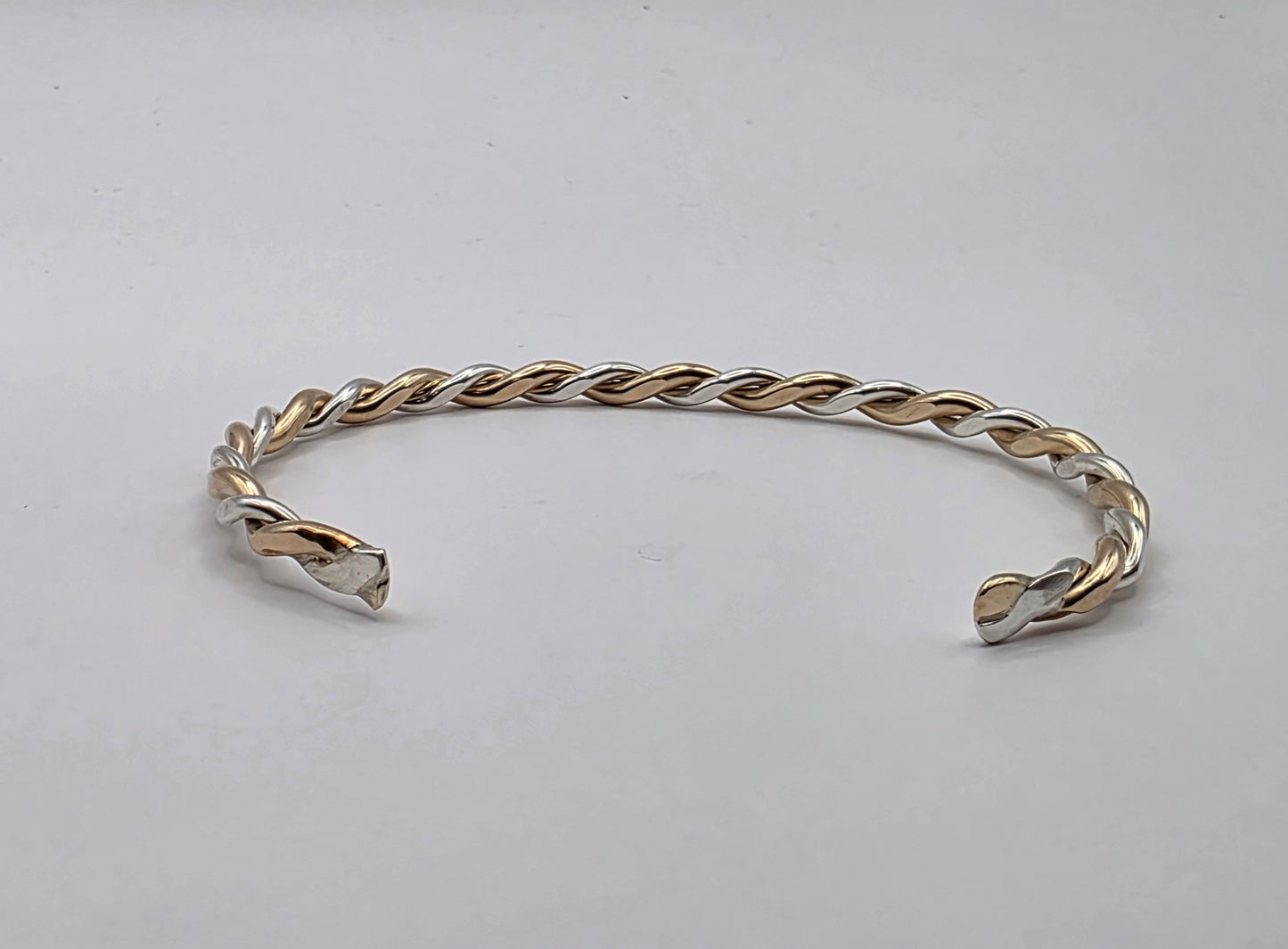 Twisted two toned smooth Sterling Silver and 14kt gold filled bracelet