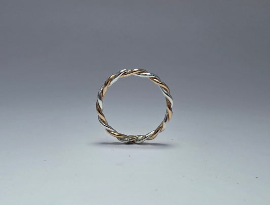 Two-toned smooth silver twist ring 1/16" wide