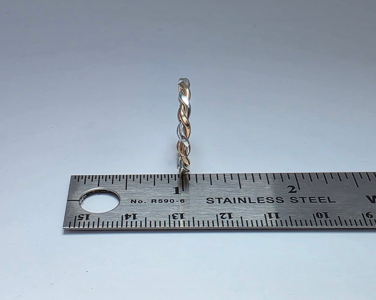 Two-toned smooth silver twist ring 1/16" wide