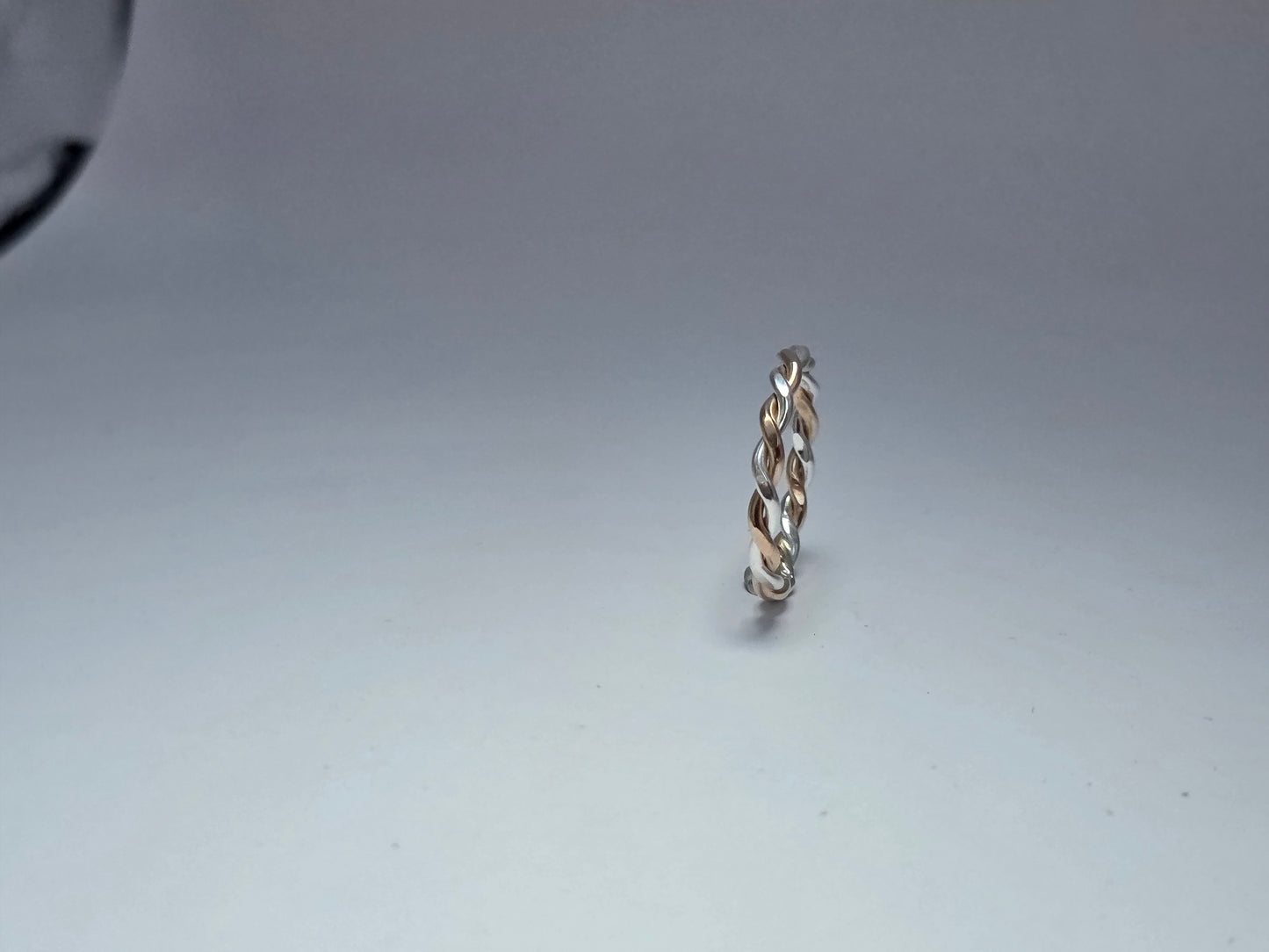 Two-toned smooth silver twist ring 1/16" wide