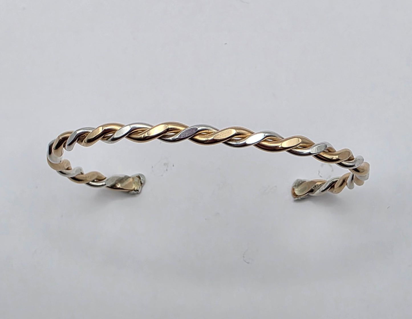 Twisted two toned smooth Sterling Silver and 14kt gold filled bracelet